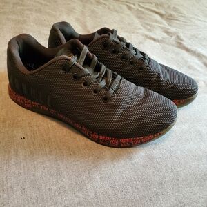 NOBULL Black Sneakers with Red text details